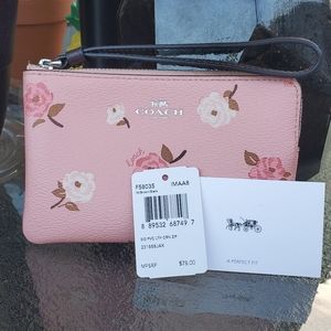 Coach™️ Pastel Pink Floral wristlet